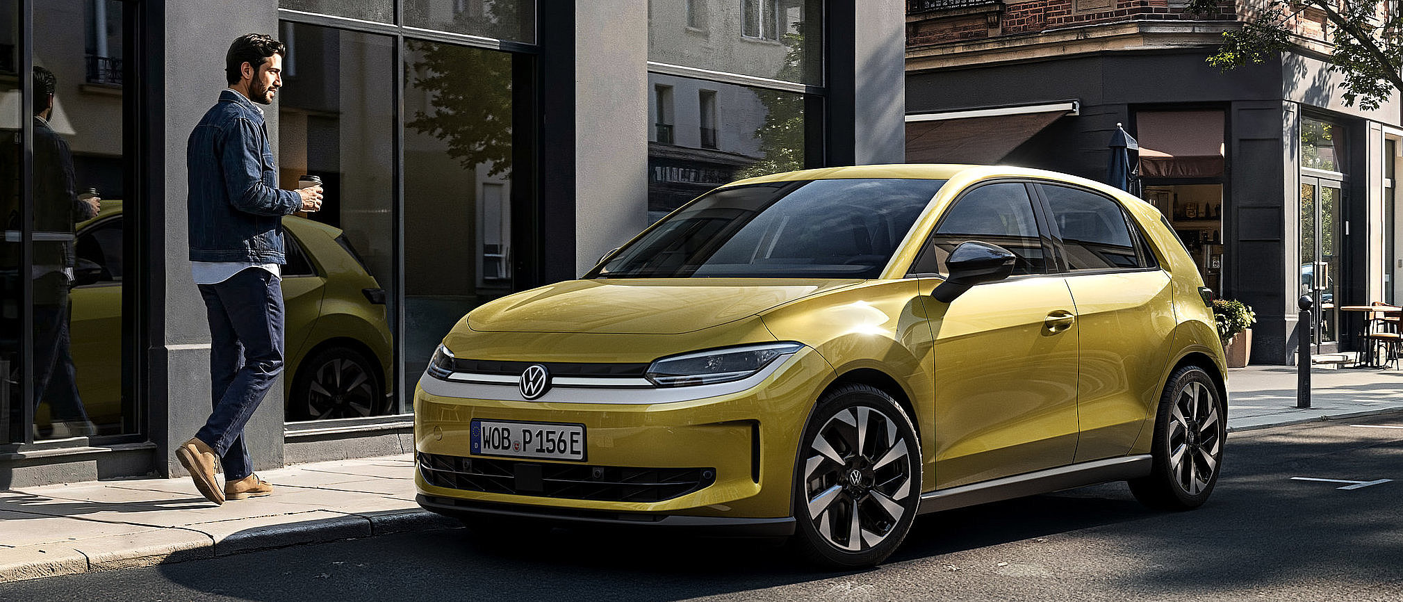 VW ID.Polo jetzt leasen! VW ID.Polo in gelb vor einer Hauswand